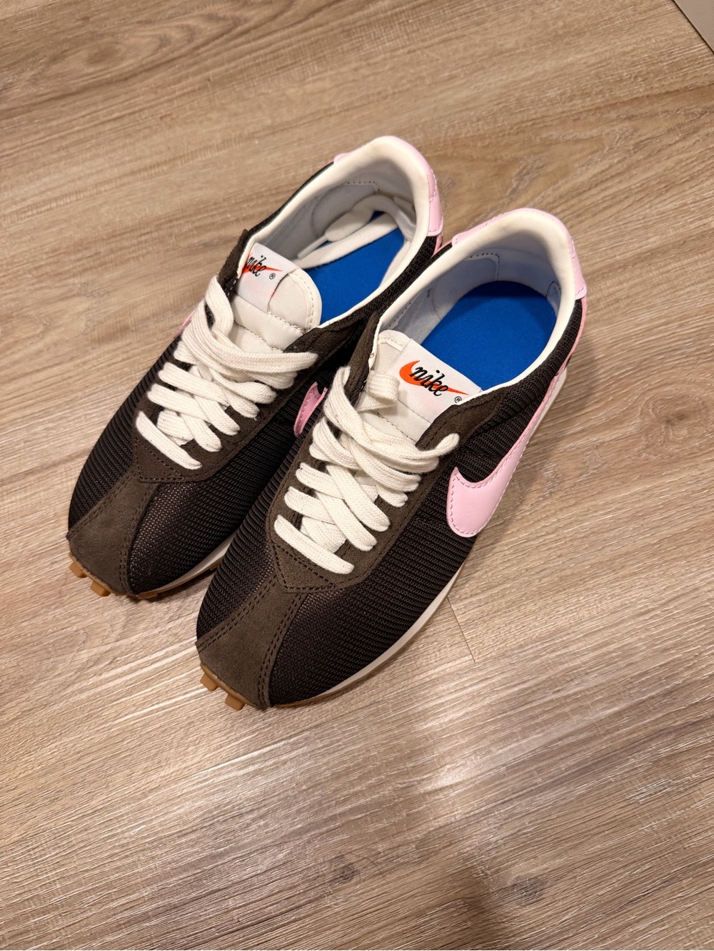Nike Women's Retro Runner in Black with Pink Swoosh